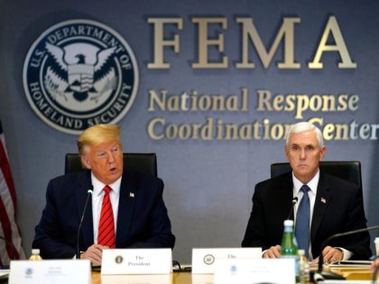 WASHINGTON, DC - MARCH 19: U.S. President Donald Trump (L) and Vice President Mike Pence attend a teleconference with governors at the Federal Emergency Management Agency headquarters on March 19, 2020 in Washington, DC. With Americans testing positive from coronavirus rising President Trump is asking Congress for $1 trillion aid …