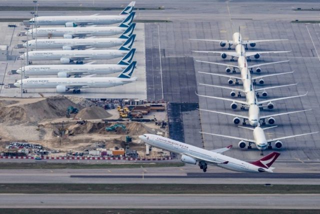 Cathay Pacific 2019 profits plunge, predicts virus losses