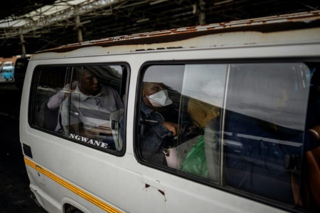 Crammed: A quarter of South Africa's population depends on minibus taxis to get to work or school © AFP Michele Spatari