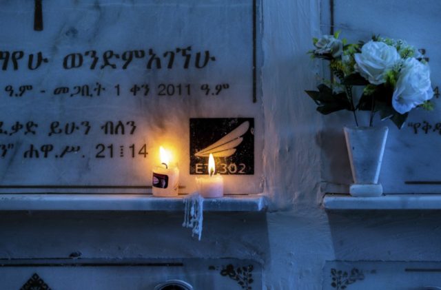 Ethiopia Plane Crash Candles are lit on a memorial wall during an anniversary memorial service to remember those who died when Ethiopian Airlines flight ET302, a Boeing 737 Max, crashed shortly after takeoff on March 10, 2019 killing all 157 on board, at the Holy Trinity Cathedral in Addis Ababa, Ethiopia Sunday, March 8, 2020. (AP Photo/Mulugeta Ayene) The Associated Press