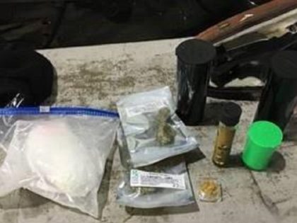 Yuma Sector Border Patrol agents seize a small quantity of drugs, cash, and firearms at an interior immigration checkpoint. (Photo: U.S. Border Patrol/Yuma Sector)