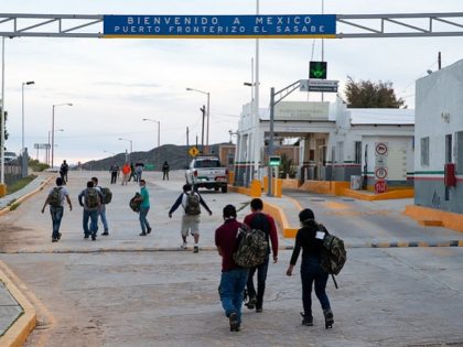A group of individuals are returned to Mexico after being encountered by U.S. Border patro