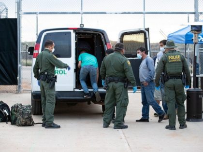 U.S. Border Patrol agents process a group of illegal aliens who crossed the border illegally from Mexico near Sasabe, Arizona on March 22. (Photo: U.S. Border Patrol/Jerry Glaser)