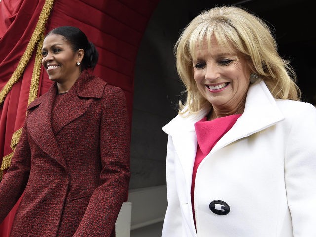 US First Lady Michelle Obama (L) and Dr. Jill Biden arrive for the Presidential Inaugurati