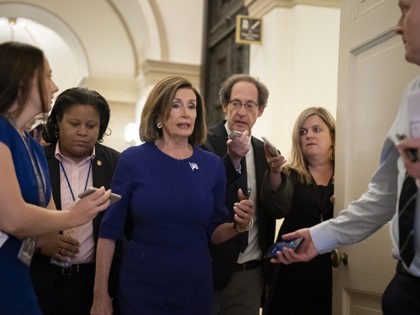 Speaker of the House Nancy Pelosi, D-Calif., is questioned by reporters as she departs the Capitol en route to a speaking event in Washington, Tuesday, Sept. 24, 2019. Pelosi will meet with her caucus later as more House Democrats are urging an impeachment inquiry amid reports that President Donald Trump …