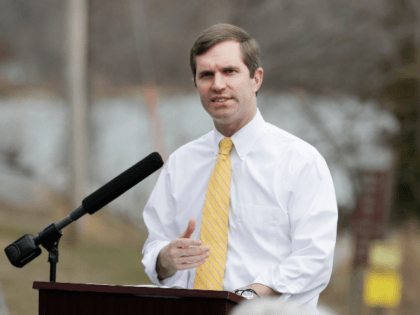 Kentucky Gov. Andy Beshear speaks after watching Asian carp being harvested from Kentucky Lake near Golden Pond, Ky., Monday, Feb. 17, 2020. The harvest method mainly targets bighead and silver carp, two of the four invasive carp species collectively known as Asian carp in the U.S. Both bighead and silver …