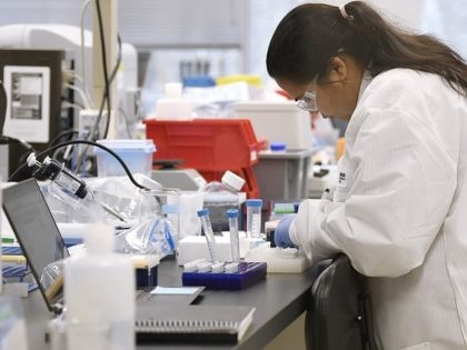 A researcher at Protein Sciences works in a lab, Thursday, March 12, 2020, in Meriden, Con