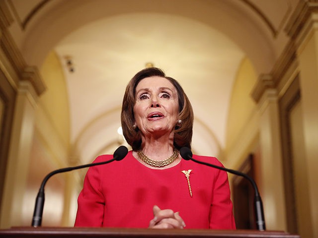 House Speaker Nancy Pelosi of Calif. speaks outside her office on Capitol Hill, Monday, March 23, 2020. (AP Photo/Andrew Harnik, Pool)