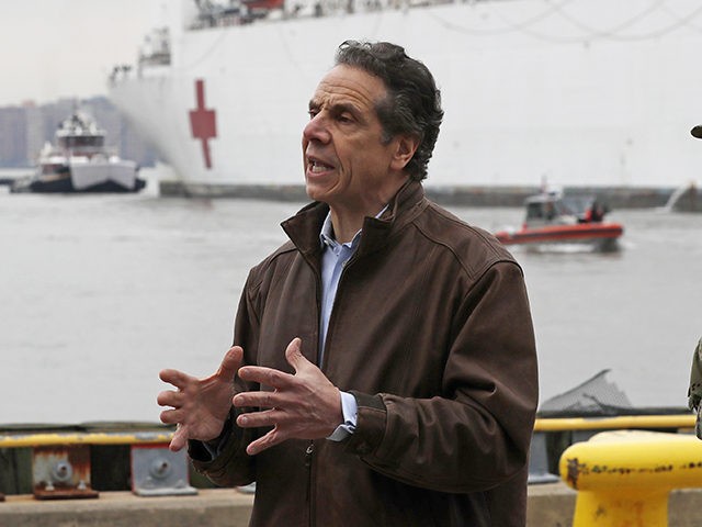New York Go. Andrew Cuomo, left, speaks as he stands beside Rear Adm. John B. Mustin after