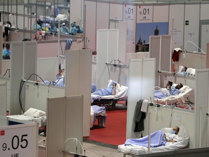 A view of a temporary field hospital set at Ifema convention and exhibition of in Madrid, Spain, Thursday, April 2, 2020. The new coronavirus causes mild or moderate symptoms for most people, but for some, especially older adults and people with existing health problems, it can cause more severe illness …