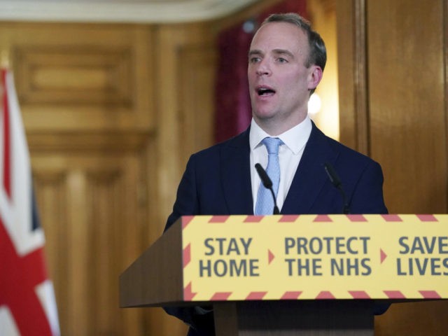 In this photo provided by 10 Downing Street, Britain's Foreign Secretary Dominic Raab delivers a speech, during a coronavirus briefing in Downing Street, London, Monday April 6, 2020. (Pippa Fowles/10 Downing Street via AP)