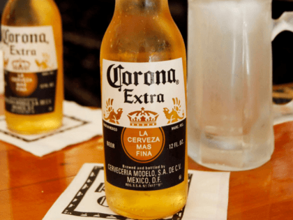 This Oct. 5, 2011 file photo, shows Corona Extra beers on a bar in Chagrin Falls, Ohio. (A