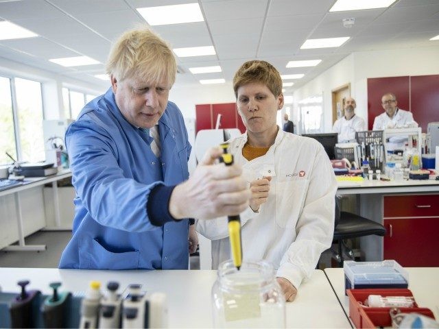 BEDFORD, ENGLAND - MARCH 06: Prime Minister Boris Johnson visits the Mologic Laboratory in