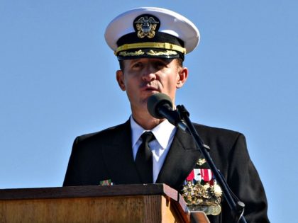 Capt. Brett Crozier addresses the crew for the first time as commanding officer of the aircraft carrier USS Theodore Roosevelt (CVN 71) during a change of command ceremony on the ship’s flight deck. Crozier relieved Capt. Carlos Sardiello to become the 16th commanding officer of Theodore Roosevelt. (U.S. Navy photo …