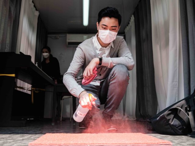 Coronavirus shoe mat (Anthony Wallace / AFP / Getty)
