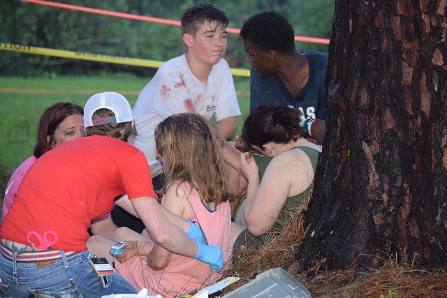 First responders and volunteers take care of people injured in the tornado that struck Onalaska on April 22. (Photo: Lana Shadwick/Breitbart Texas)