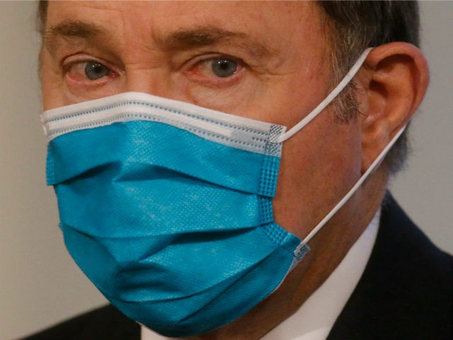 Utah Gov. Gary Herbert wears his face mask during the daily COVID-19 media briefing at the