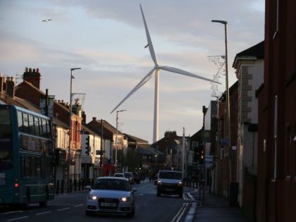 A general view shows a wind turbine over the town of Blyth in northeast England on December 13, 2019 the day after the former mining town voted in a Conservative MP for the first time in its history contributing to the Tory party's landslide victory. - UK Prime Minister and …