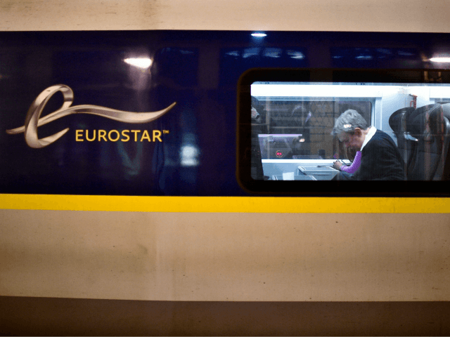 Passengers sit aboard the last Eurostar train before Brexit at Gare du Nord train station in Paris, on January 31, 2020. - Britain leaves the European Union at 2300 GMT on January 31, 2020, 43 months after the country voted in a June 2016 referendum to leave the block. The …