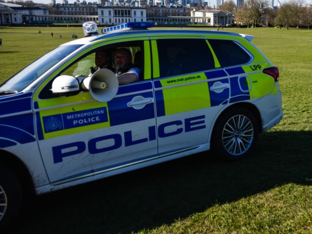 LONDON, ENGLAND - APRIL 05: A Police car is seen patrolling Greenwich Park on April 5, 2020 in London, England . The Coronavirus (COVID-19) pandemic has spread to many countries across the world, claiming over 60,000 lives and infecting over 1 million people. (Photo by Peter Summers/Getty Images)
