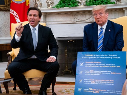 WASHINGTON, DC - APRIL 28: Florida Gov. Ron DeSantis (L) speaks while meeting with U.S. President Donald Trump in the Oval Office of the White House on April 28, 2020 in Washington, DC. Trump met with DeSantis to discuss ways that Florida is planning to gradually re-open the state in …