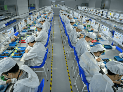 HENZHEN, CHINA -SEPTEMBER 24: Workers make pods for e-cigarettes on the production line at Kanger Tech, one of China's leading manufacturers of vaping products, on September 24, 2019 in Shenzhen, China. Global production for e-cigarette and vaping products is centered in a five-square-mile district of Shenzhen, China, which is the …