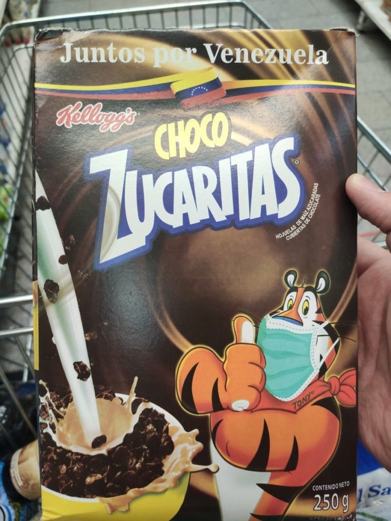 Chocolate frosted flakes with coronavirus branding in Caracas, Venezuela. Nicolás Maduro seized the city's Kellogg plant in 2018 after the company left the country and manufactures "Kellogg's" cereals with no regard to intellectual property law.