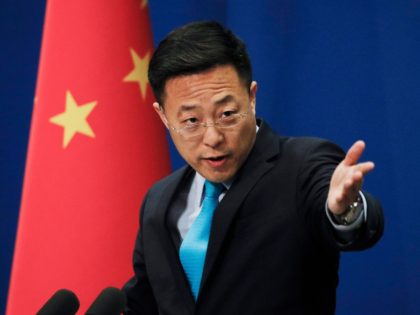 Chinese Foreign Ministry new spokesman Zhao Lijian gestures as he speaks during a daily briefing at the Ministry of Foreign Affairs office in Beijing, Monday, Feb. 24, 2020. China's foreign ministry on Monday said it didn't matter that three expelled journalists had nothing to do with a Wall Street Journal …