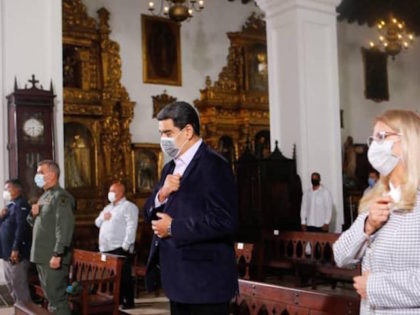 Nicolas Maduro, wife Cilia Flores, and social VIPs attend Holy Thursday Mass in Venezuela, April 9, 2020.