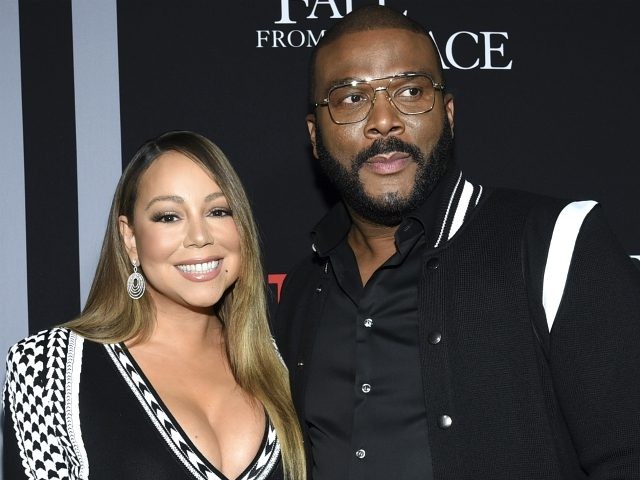 Singer Mariah Carey, left, and filmmaker Tyler Perry pose together at the premiere of Tyle