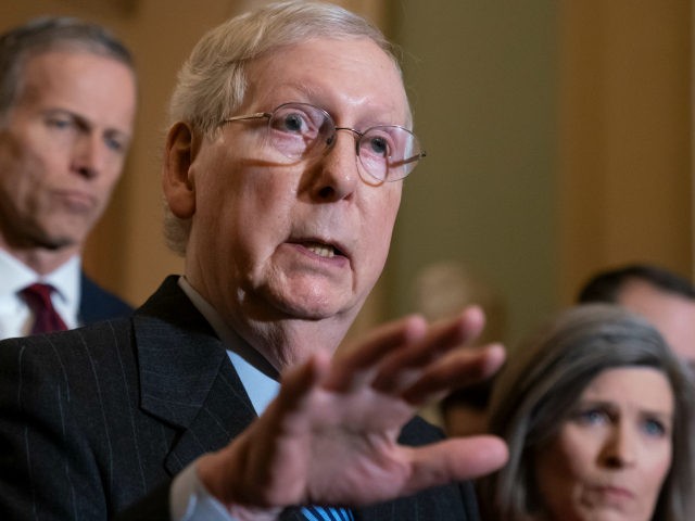 Senate Majority Leader Mitch McConnell, R-Ky., joined by Majority Whip John Thune, R-S.D., left, and Sen. Joni Ernst, R-Iowa, tells reporters he has secured enough Republican votes to start President Donald Trump's impeachment trial and postpone a decision on witnesses and documents Democrats want, at the Capitol in Washington, Tuesday …