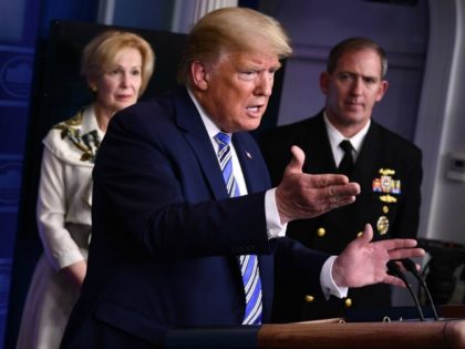 US President Donald Trump, flanked by (from L) US Vice President Mike Pence, US Attorney General William Barr, Response coordinator for White House Coronavirus Task Force Deborah Birx and Rear Admiral John Polowczyk, gestures as he speaks during the daily briefing on the novel coronavirus, COVID-19, at the White House, …