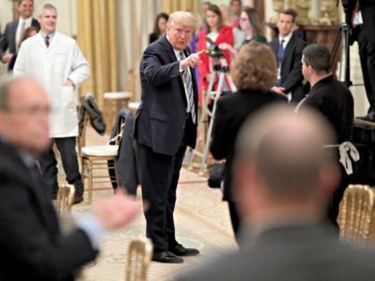 WASHINGTON, DC - APRIL 28: U.S. President Donald Trump talks with small business owners while departing an event on supporting small businesses through the Paycheck Protection Program in the East Room of the White House April 28, 2020 in Washington, DC. An total of $659 billion has been allocated for …