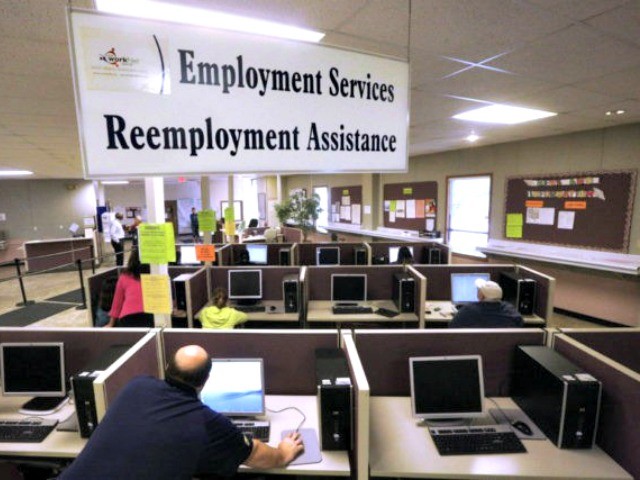 FILE - This Thursday, Sept. 29, 2016, file photo, shows the Illinois Department of Employment Security office in Springfield, Ill. On Thursday, Dec. 28, 2017, the Labor Department reports on the number of people who applied for unemployment benefits the week before. (AP Photo/Seth Perlman, File)