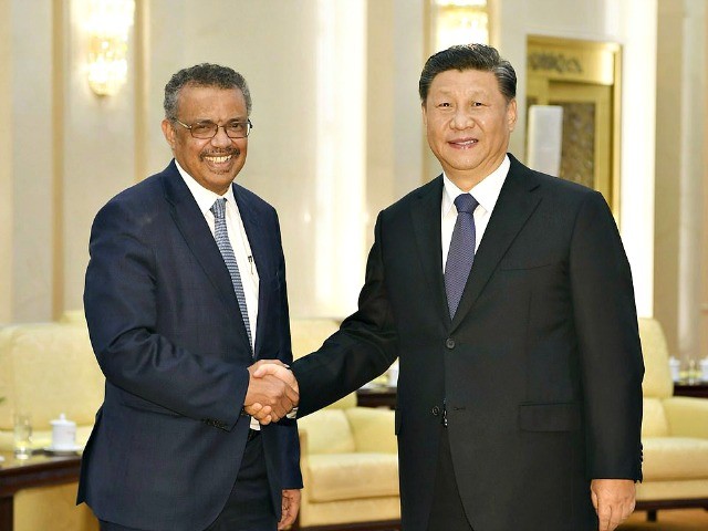 BEIJING, CHINA - JANUARY 28: Tedros Adhanom, Director General of the World Health Organization, (L) shakes hands with Chinese President Xi Jinping before a meeting at the Great Hall of the People, on January 28, 2020 in Beijing, China. (Photo by Naohiko Hatta - Pool/Getty Images)