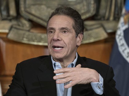 In this April 18, 2020 photo provided by the Office of Governor Andrew M. Cuomo, Gov. Cuomo provides a coronavirus update during a press conference in the Red Room at the State Capitol in Albany. New York's daily toll of coronavirus deaths hit its lowest point in more than two …