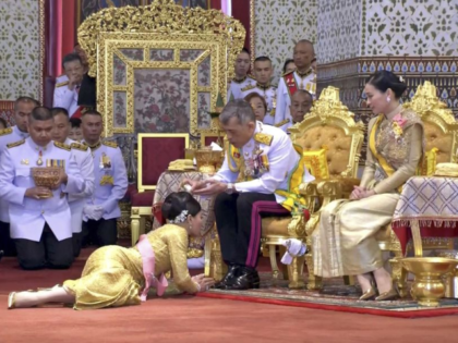 In this image made from video, Thailand’s King Maha Vajiralongkorn, center, and Queen Suthida, right, attend the second of a three-day coronation ceremony for Thai King Maha Vajiralongkorn that includes bestowing of the royal title and granting of ranks to members of royalty at Grand Palace in Bangkok, Sunday, May …