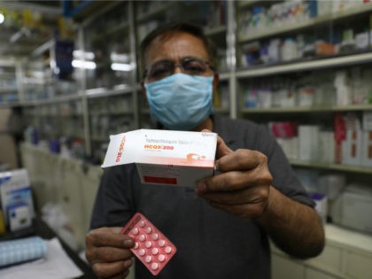 A chemist displays hydroxychloroquine tablets in New Delhi, India, Thursday, April 9, 2020. Amidst concerns over domestic shortage, India has lifted the ban on some drug exports including hydroxychloroquine. President Donald Trump and his administration are promoting the anti-malaria drug not officially approved for fighting the new coronavirus, even though …