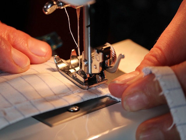 closeup sewing machine masks