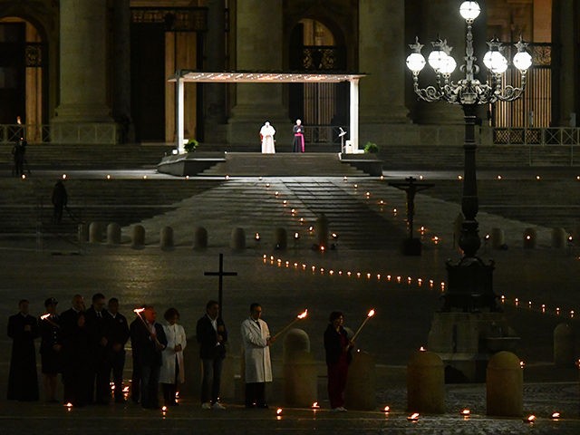 Pope Francis (Rear Top C) presides over Good Friday's Way of the Cross (Via Crucis) a