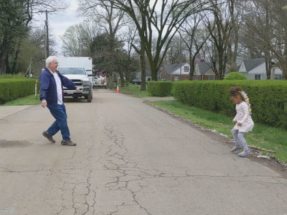 WATCH: Girl Dances with Beloved Grandpa While Standing Six Feet Apart