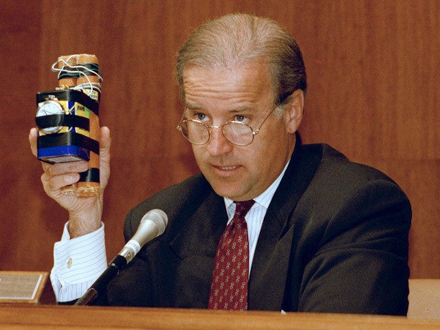 Sen. Joe Biden (D-Del.), chairman of the Senate Judiciary Committee holds up an explosive device during a hearing of the committee on Capitol Hill, April 22, 1993. The committee was holding hearings on terrorism in the United States. (AP Photo/Charles Tasnadi)