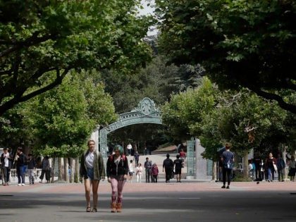 People walk in front of Sather Gate on the University of California at Berkeley campus in