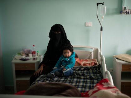FILE - In this Feb. 27, 2020 file photo, Yazan, 1, sits with his mother before his heart surgery at the Tajoura National Heart Center in Tripoli, Libya. Yazan's odyssey from his small desert hometown to the hospital barely skirted the war's front lines. In conflict zones across the Middle …