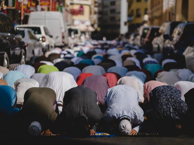 Muslims praying outside