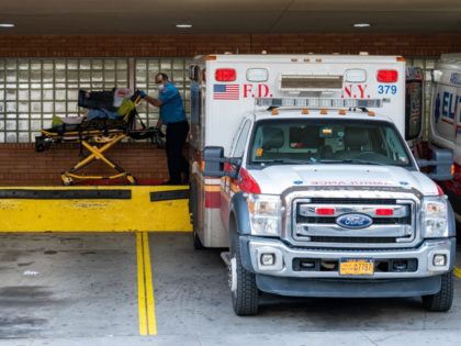 NEW YORK, NY - APRIL 7: A person is transported from an ambulance to the emergency room at Wyckoff Heights Medical Center on April 7, 2020 in New York, United States. Gov. Andrew M. Cuomo said on Tuesday in his daily briefing that 731 people had died since the prior …
