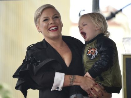 Pink holds son Jameson at a ceremony where the singer received a star on the Hollywood Wal