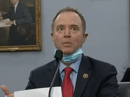 Rep. Adam Schiff (D-CA) brought a face mask to a Congressional hearing Thursday, but he strapped it under his chin while speaking.