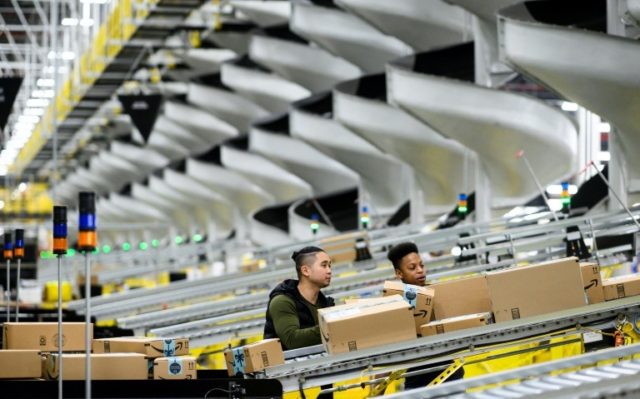 Temperature checks, masks new norm for Amazon employees