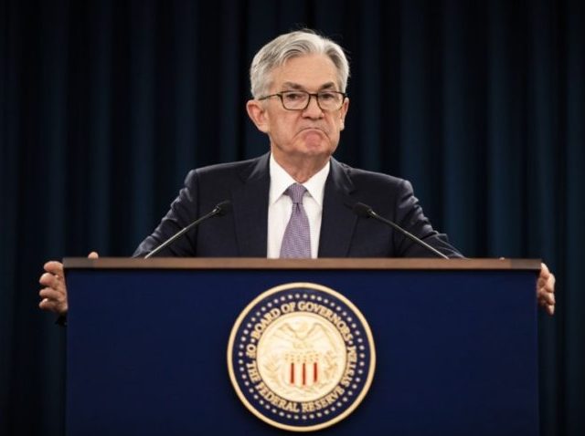 In this Jan. 29, 2020 file photo, Federal Reserve Chair Jerome Powell pauses during a news conference in Washington. The Federal Reserve is taking additional steps to provide up to $2.3 trillion in loans to suport American households and businesses as well as local governments as they deal with the …